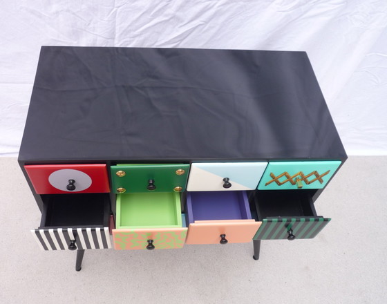 Image 1 of Minikast met 12 laden