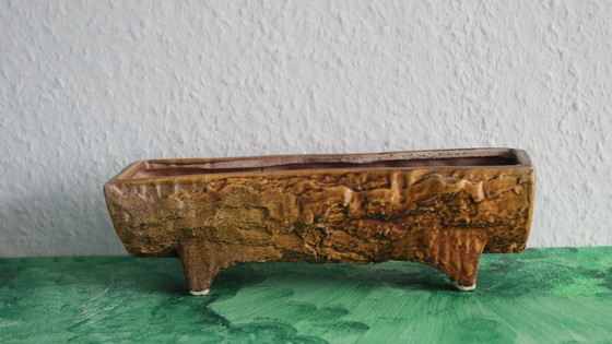 Image 1 of Jardinière vintage en forme de tronc d'arbre, en céramique de la manufacture Vetter.