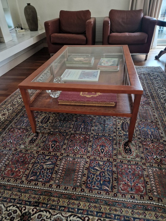 Image 1 of Beautiful cherry wood coffee table with glass top and display shutters