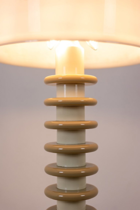 Image 1 of Ettore Sottsass. Floor lamp in white and beige lacquered wood. 1980s-90s