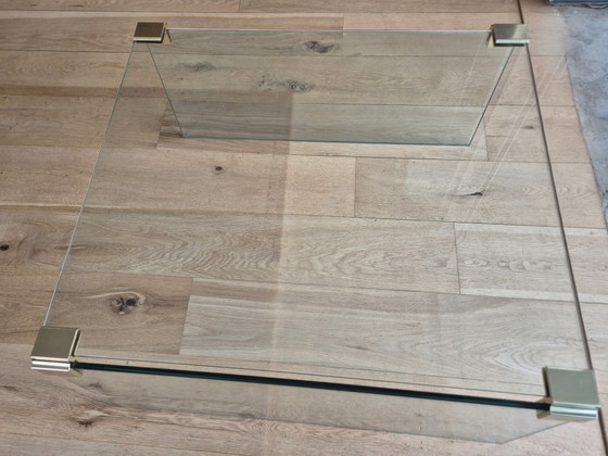 Glass coffee table with brass-colored details. – Side tables (photo 3 of 5)