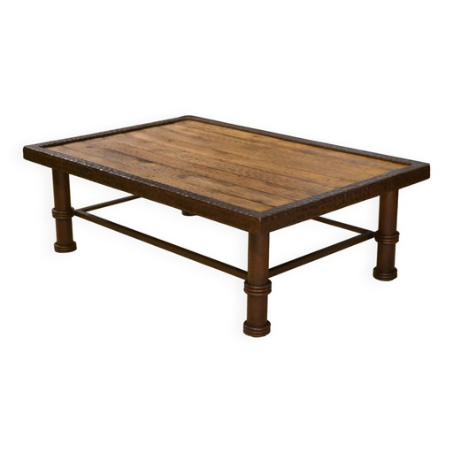 Brutalist coffee table made of wood and wrought iron from the 1960s.