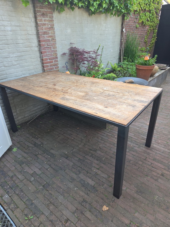 Image 1 of Steel table with teak top