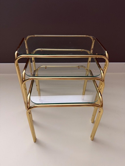 Vintage Mid Century Modern Chrome en glazen bijzettafelset van 3
