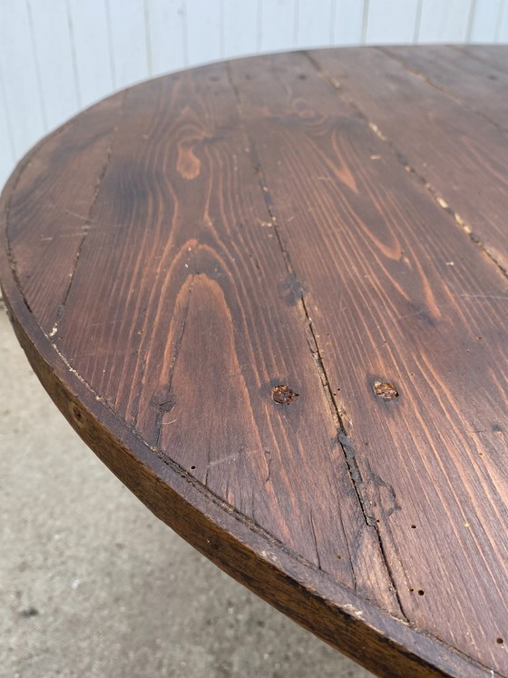 Image 1 of antique folding round winemaker's target table with tilting top