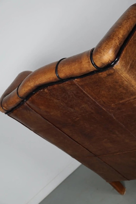 Image 1 of Vintage Nederlandse cognackleurige leren clubfauteuil