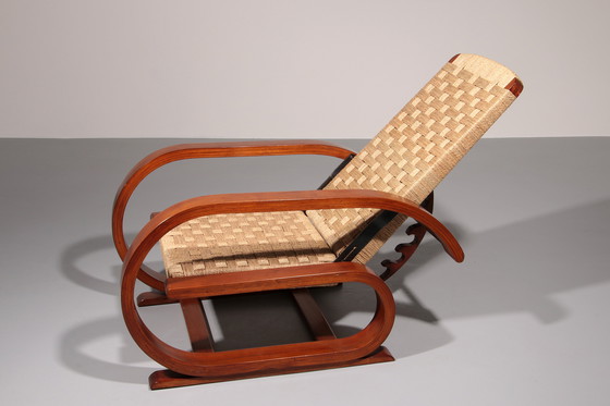 Image 1 of Een uitzonderlijk zeldzame mahoniehouten fauteuil gemaakt in Italië in de jaren 1950