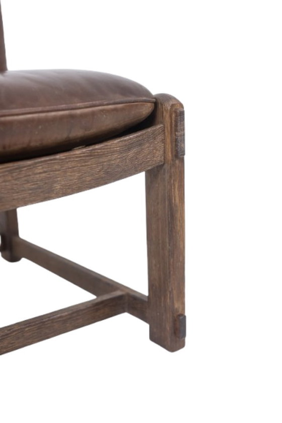 Image 1 of Paar eikenhouten loungestoelen, bekleed met leer. Gemaakt in de jaren 60.