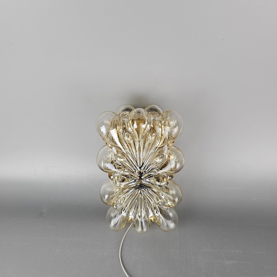 Image 1 of Vintage glass bubble wall lamp by Glashutte Limburg. Design by Helena Tynell. Glass and brass. 1960, Germany.