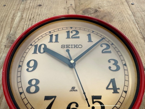 Image 1 of Vintage rode Seiko scheepswandklok, jaren 70