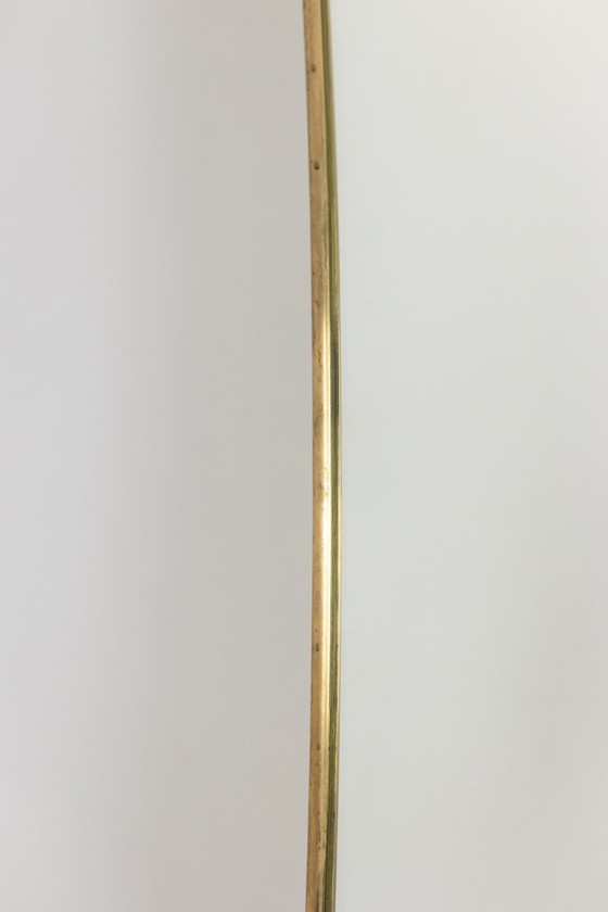 Image 1 of Specchio con cornice in ottone dorato. Anni '80.