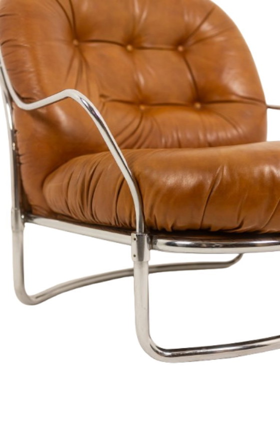 Image 1 of Carlo Di Carli. Lederen en metalen fauteuil. Jaren 70.