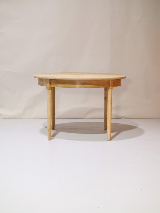 Image 1 of Extendable dining table Henning Kjaernulf oak Danish