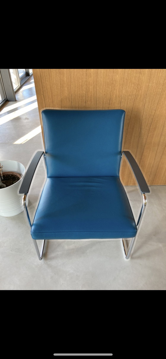 Image 1 of Leolux Talassa Fauteuil Senseo leather 3040 and spruzza armchair.