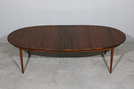 Image 1 of Table à manger ovale extensible en bois de rose par Niels O. Møller