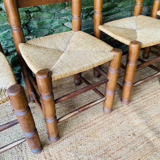 Image 1 of Set van 4 massief houten stoelen met rieten zittingen
