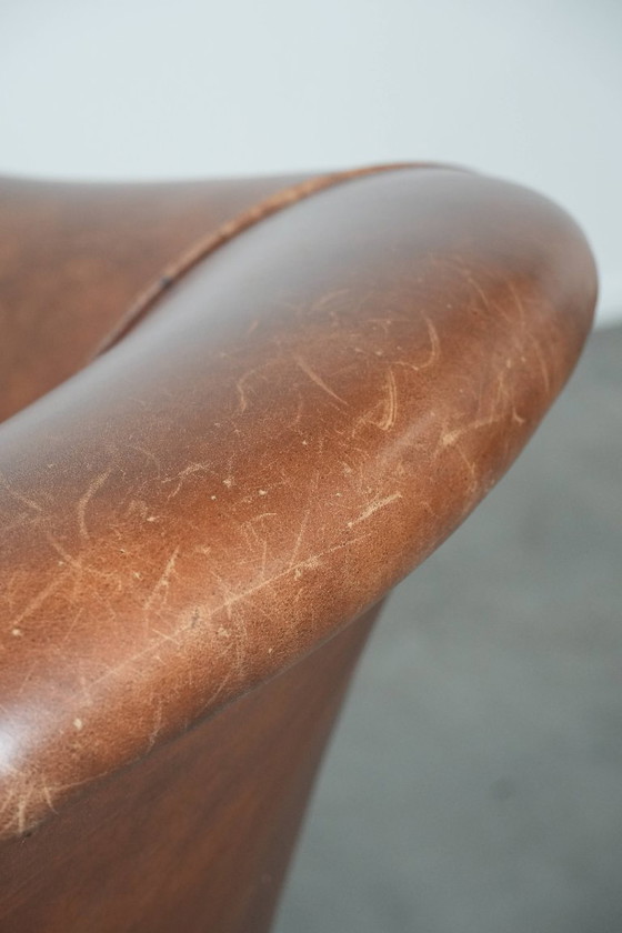 Image 1 of cognac kleurige vintage rundleren clubfauteuil in Engelse stijl 