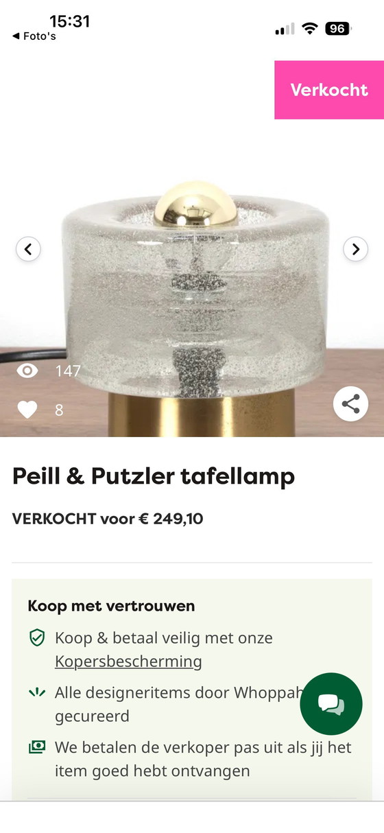 Image 1 of vintage table lamp by Peill & Putzler is made of thick ice glass with brass details