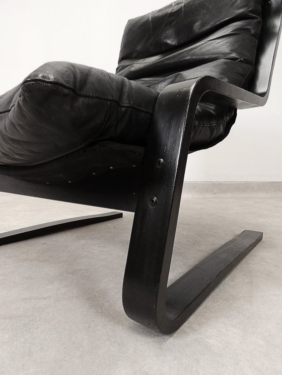 Image 1 of  high-back lounge chair in black leather