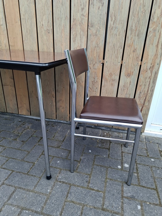 Image 1 of Vintage kitchen table with 2 chairs. 1960s