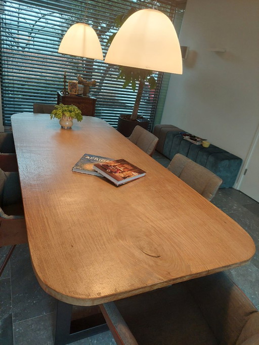 Very solid,  beautiful dining table for sale, oak wood, with solid black, iron frame 