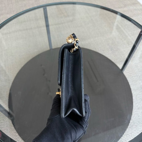 Image 1 of Sac Chanel Mini Flap Chic en agneau perlé noir, finitions dorées, série 28