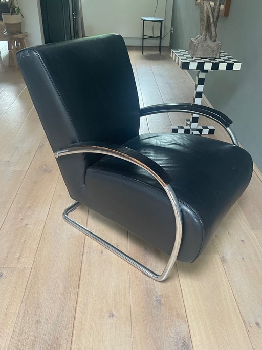 Set of Molinari Lounge chairs, black leather with chrome and black wood armrests.