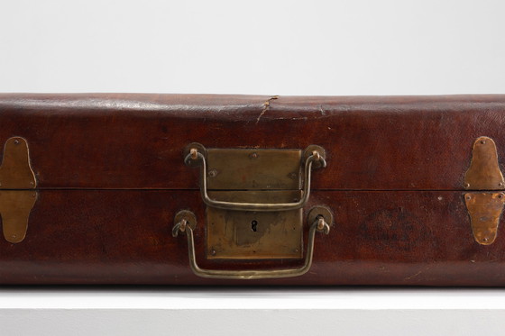 Image 1 of Vintage brown leather suitcase with copper details, China 1900s