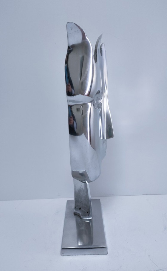 Image 1 of sculpture visage stylisé métal poli