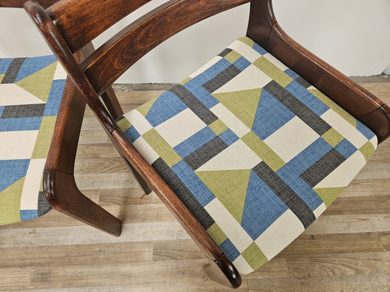 Image 1 of 70s eetkamerstoelen in beukenhout en stoffen uit het ruimte-tijdperk