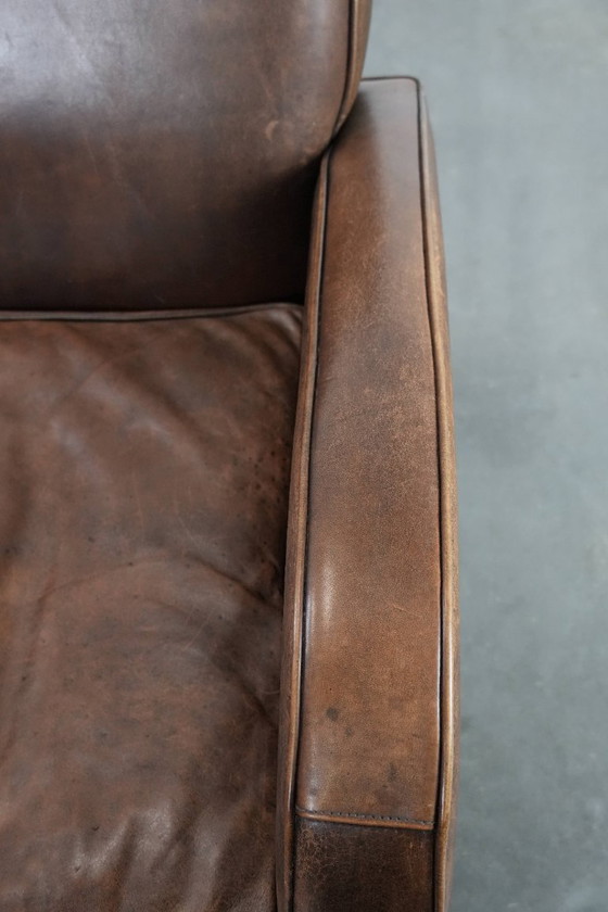 Image 1 of Poltrona in pelle di pecora dal design elegante e dalle belle forme rotonde