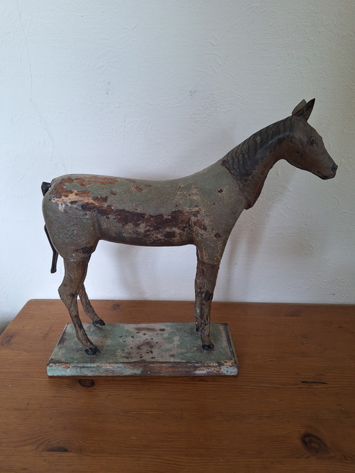 Vintage wooden figurine horse
