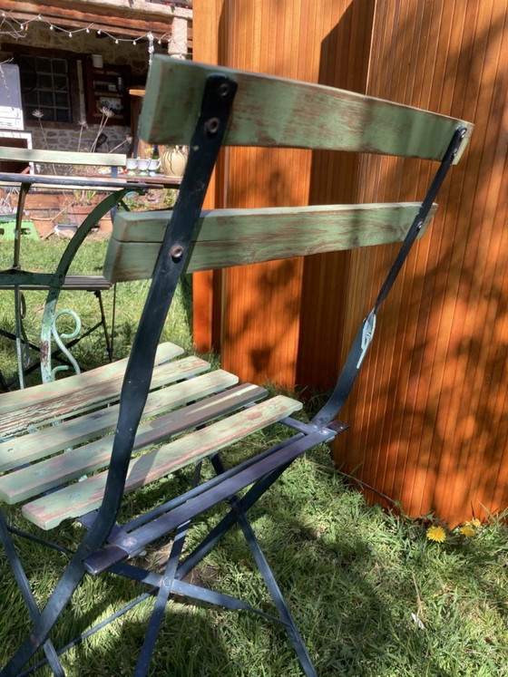 Image 1 of Conjunto de bistró antiguo de hierro forjado: mesa y sillas plegables de la década de 1930.