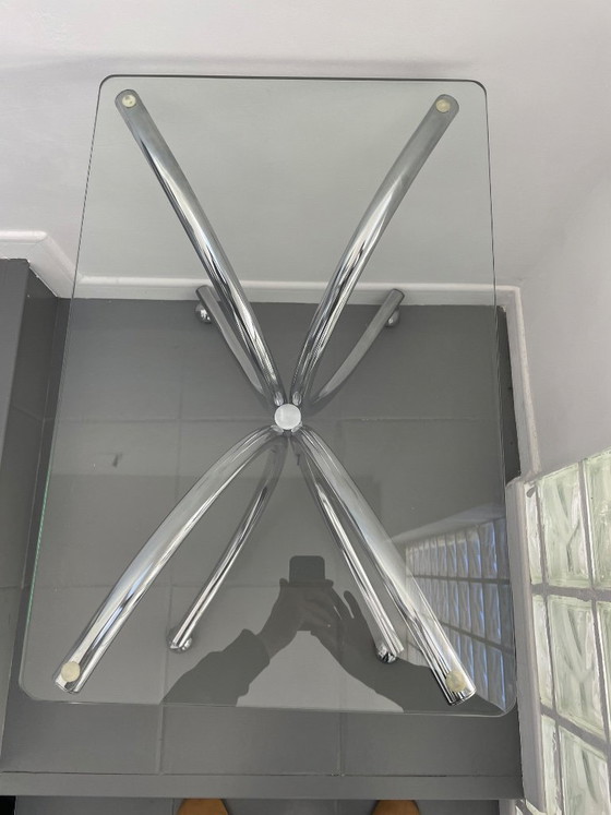 Image 1 of Salontafel van chroom en glas met wielen