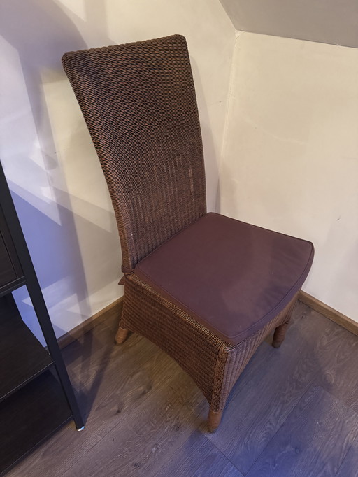 8 Lloyd Loom stoelen met bijhorende kussens 2 met armleuningen y 6 zonder leuning 