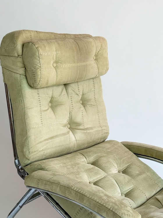 Image 1 of Vintage 1970s recliner with distinctive tubular steel construction