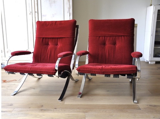 Set of red armchairs.