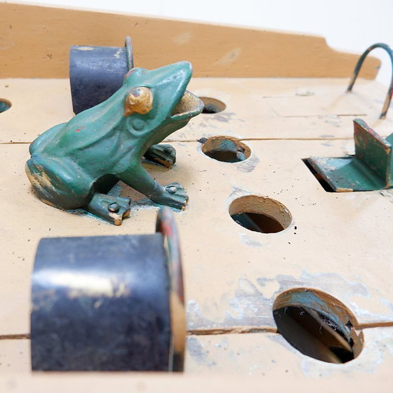 Image 1 of "The Frog Game", an old game made of wood and painted iron, early 20th century
