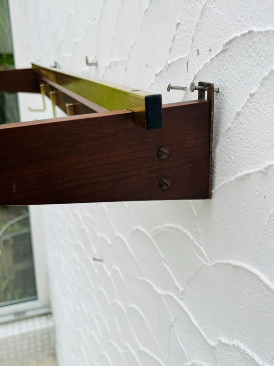 Image 1 of Vintage 1970s wooden and brass wall-mounted coat rack