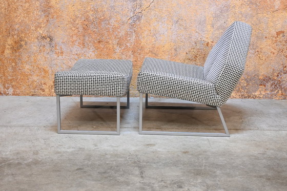 Image 1 of Sillón Leolux Wibber único en tela blanca y negra con otomana.