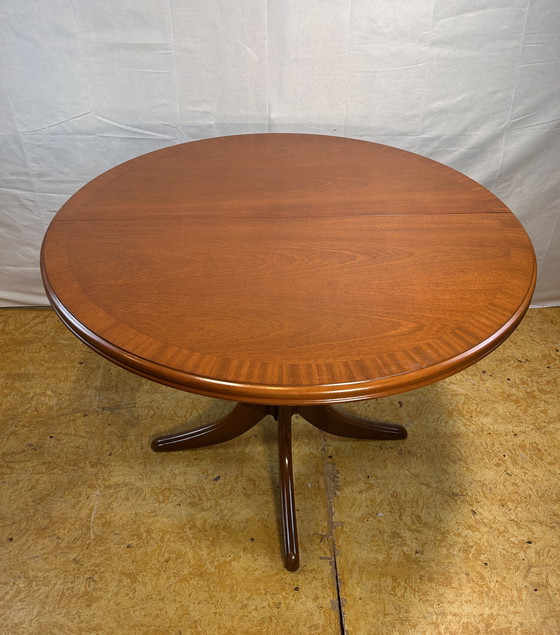Image 1 of Mid-Century Retro Vintage Teak Extending Round Dining Table by Parker Knoll – 1970  Elegant | Space-Saving | Practical | Iconic 