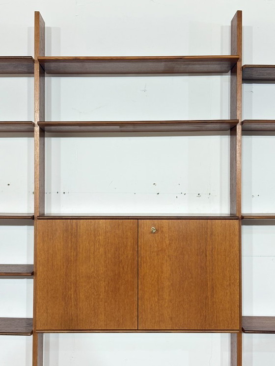 Modular mid-century wall shelf by interna-Peter Pedrides / Teak shelving system 1960s – Shelving unit, Wood (photo 14 of 27)