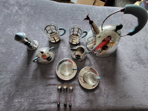 Alessi kettle, tea glasses, espresso glasses, milk, sugar, spoon, salt