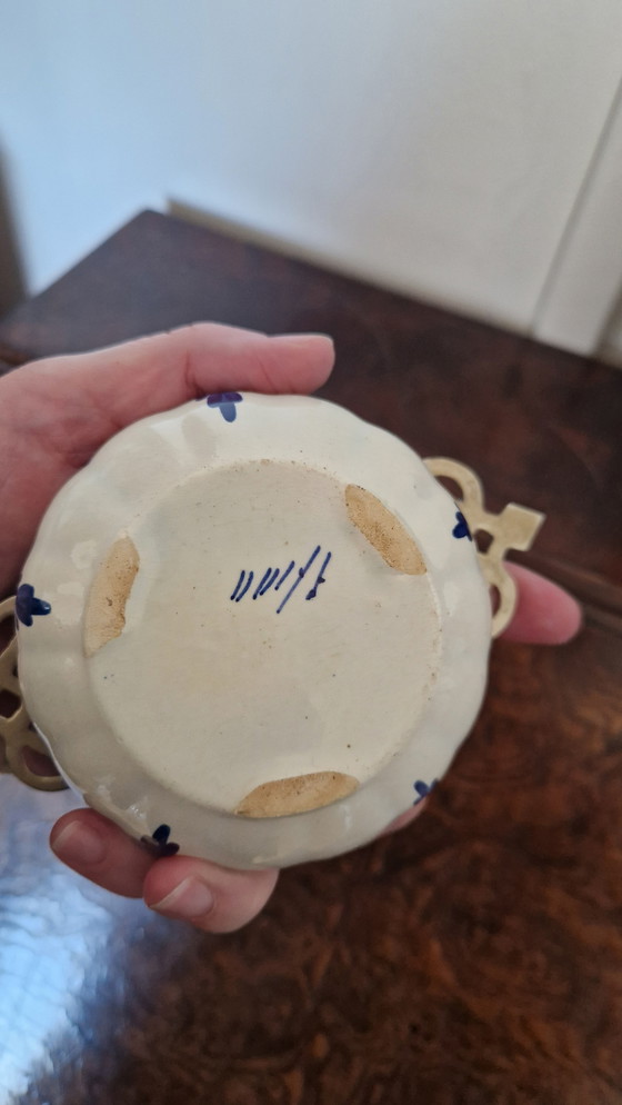 Image 1 of Delft blue tea strainer.