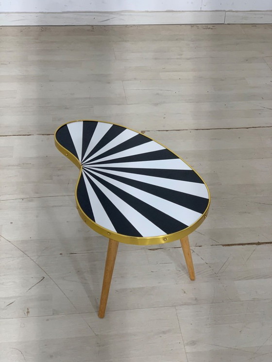 Image 1 of Vintage niervormige salontafel Bloemetjesbank