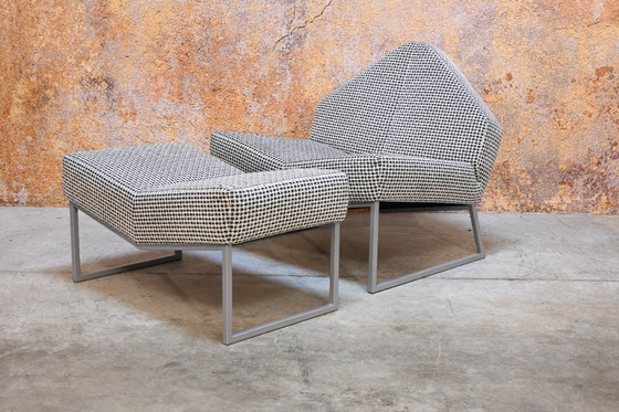 Image 1 of Sillón Leolux Wibber único en tela blanca y negra con otomana.