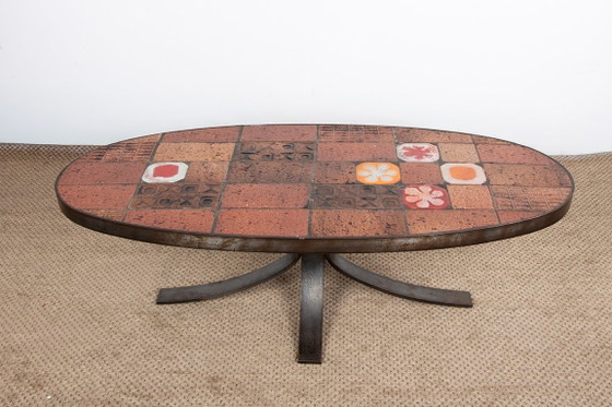 Image 1 of Tavolino da caffè in pietra lavica, ceramica e acciaio, disegnato da Jean Jaffeux nel 1960.