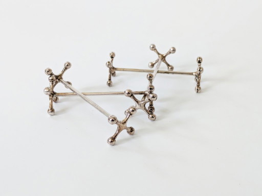 Juego de 4 soportes para cuchillos WMF plateados con forma de Jack, Alemania, década de 1970. – tafelaccessoires, Silver