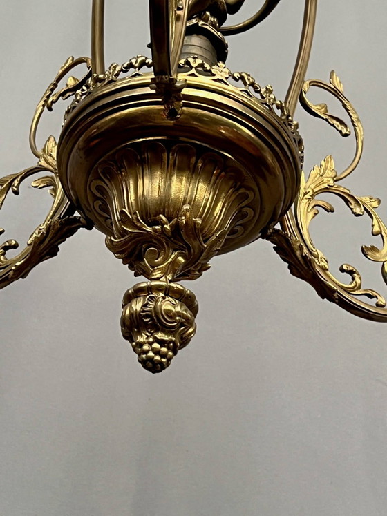 Renaissance chandelier with putti statuette. – Bronze, Copper (photo 6 of 9)