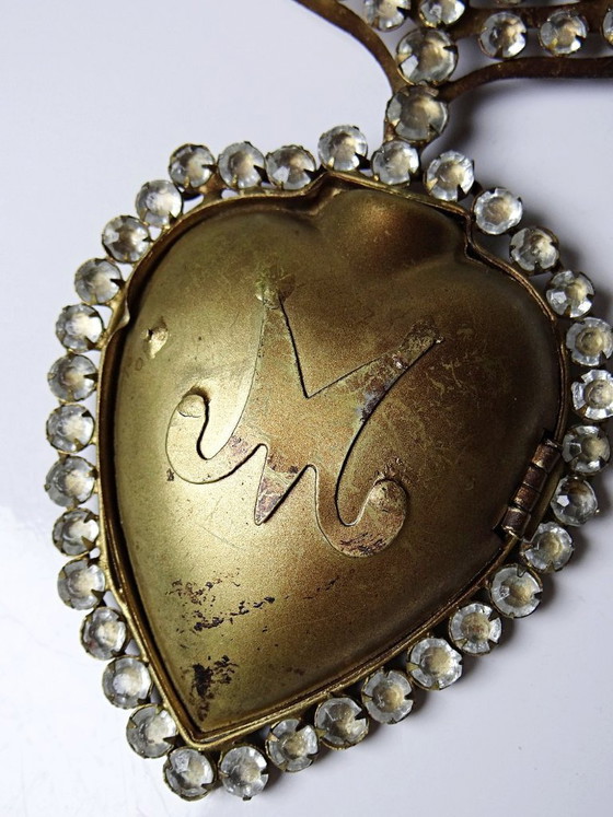 Image 1 of Ex voto antico, cuore fiammeggiante di Maria di Pomponne, tempestato di strass, XIX-XX secolo.